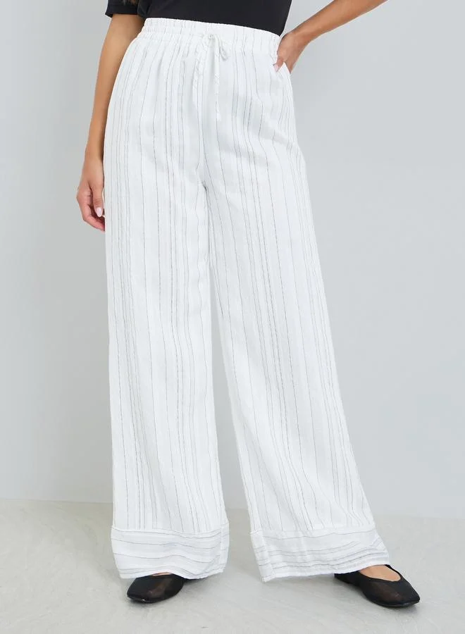 Styli Women Off-White Striped Wide Leg Trousers